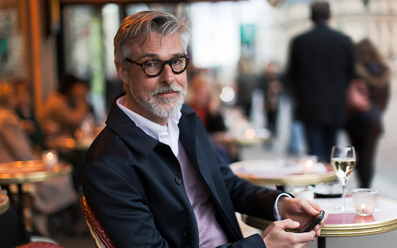 photo of older gentleman in a cafe photo of older gentleman in a cafe